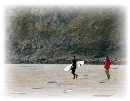Surfer at Mawgan Porth Surfer at Mawgan Porth